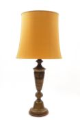 A 20th century large patinated bronze table lamp with central band of 'Archaic' decoration in