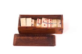 A 19th Century miniature bone set of dominoes within wooden box, 5.