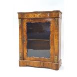 A Victorian walnut and marquetry pier cabinet with cross-banding,
