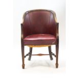 A 19th century framed tub shaped chair with leatherette seat and back