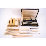 A collection of Victorian mounted clothes brushes, glove stretchers,