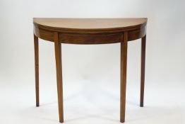 A George III mahogany and boxwood strung 'D' end tea table,