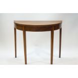 A George III mahogany and boxwood strung 'D' end tea table,