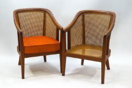 A pair of mid-20th century tub shaped Bergere chairs,