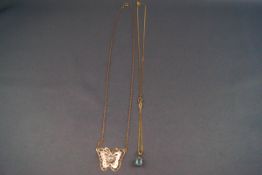 Two 9ct gold pendant and chains to include a yellow and white gold diamond set butterfly necklace