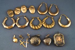 A selection of jewellery to include four pairs of earrings and one single, a heart charm,