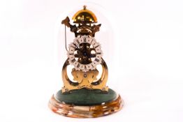 A small 20th century brass skeleton clock, engraved Thwaites and Reed,
