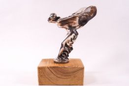 A Rolls Royce car mascot, modelled as the Spirit of Ecstasy, 18cm high,