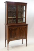 An Edwardian and satinwood strung display cabinet,