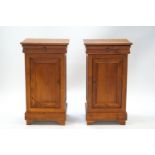A pair of French bedside cupboards, each with a drawer stamped J C Nicol, 75cm high x 41.