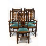 A set of six carved oak dining chairs, including two carvers, with barley twist supports,