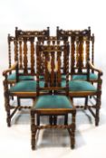 A set of six carved oak dining chairs, including two carvers, with barley twist supports,