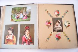 Two albums containing Victorian greetings cards and scraps (one only partially full)