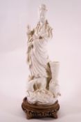 A Chinese blanc de chine porcelain figure, possibly G 30cm high,