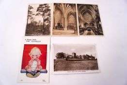 A small collection of postcards. Mainly views and A Happy Smile from clovelly, Mabel Lucie Attwell.