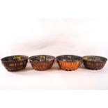 Four copper plated jelly moulds,