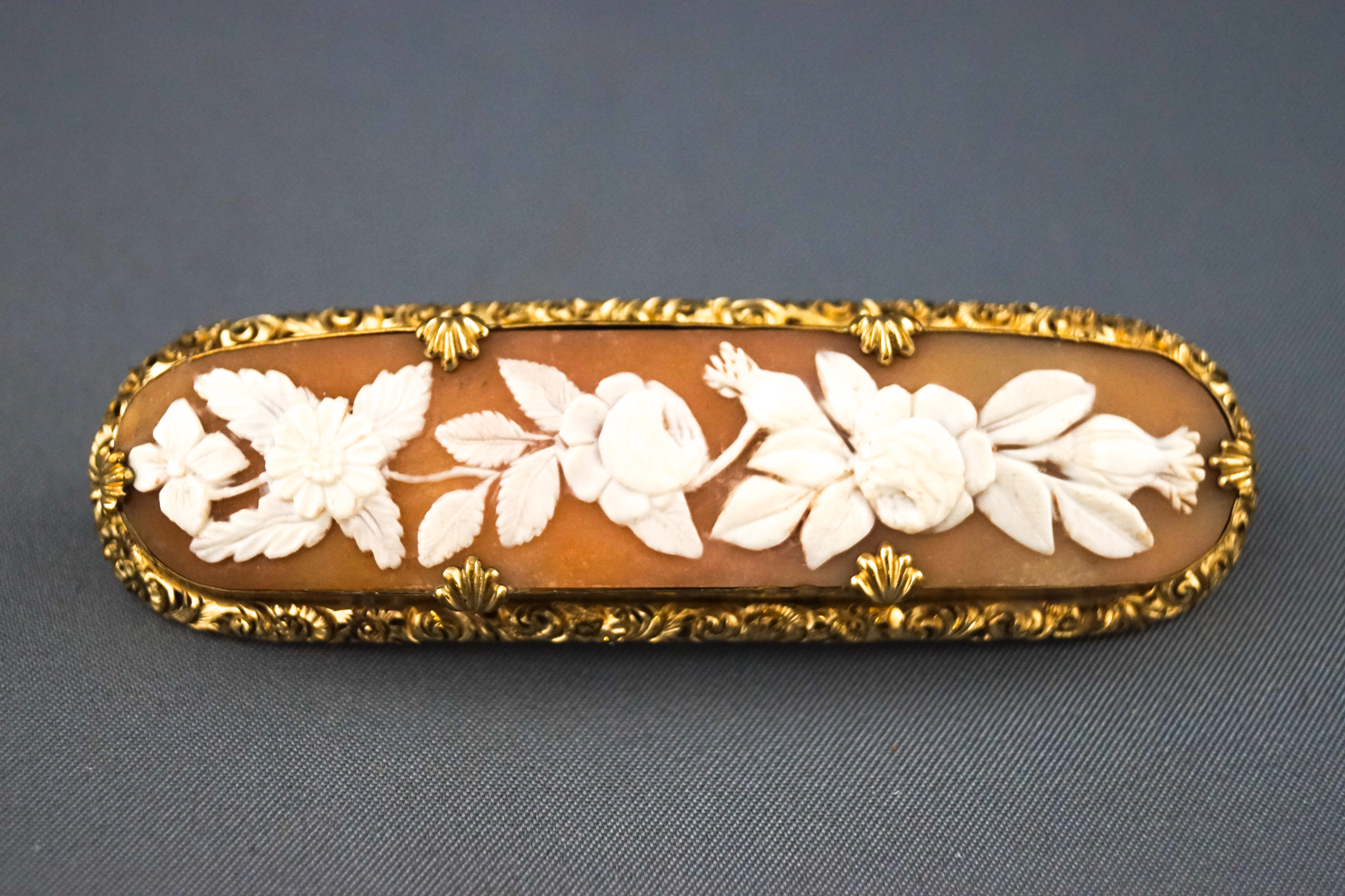 A gilt-metal and shell cameo oblong brooch depicting trailing flowers in Victorian style within a - Image 2 of 2