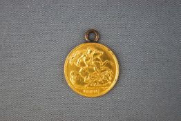 A 22ct yellow gold half Sovereign dated 1906 (With soldered jump ring) 4.