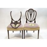 A pair of George III mahogany side chairs, heart shape backs with pierced fan splats,