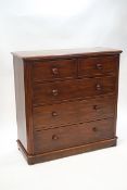 A Victorian mahogany chest of two short and three long graduated drawers with turned handles,