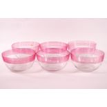 A set of six 20th century glass finger bowls, each with pink ribbed detail,12.