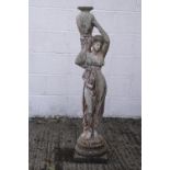 A reconstituted stone figure of a lady wearing Classical robes, holding a water carrier,