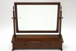 An Edwardian mahogany and inlaid rectangular swing frame mirror, the box base with two drawers,