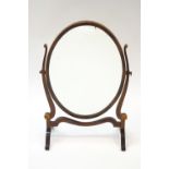 A 19th century mahogany swing frame mirror,