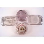 Four Edwardian glass advertising paperweights: The Kennicott Water Softener Co,