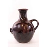 A Studio pottery vessel by John Leech, with treacle and lustre glaze, impressed JL monogram, 30.