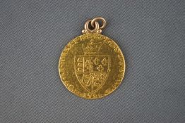 A 22ct yellow gold full shield Sovereign George IV gold coin dated 1788 (With soldered jump ring) 8.