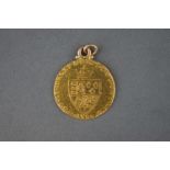 A 22ct yellow gold full shield Sovereign George IV gold coin dated 1788 (With soldered jump ring) 8.