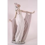 A Lladro porcelain figure of 'Dama Solemne', 34cm high,