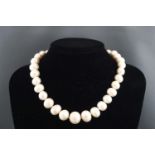 A single strand of graduated freshwater cultured pearls, potato shape, measuring from 13.0mm to 17.