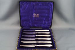 A set of six silver handled knives by Allen & Darwin, Sheffield 1907,