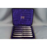 A set of six silver handled knives by Allen & Darwin, Sheffield 1907,