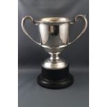 A silver two handled trophy cup, 19.