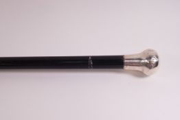 A gentleman's ebonised evening cane with silver knop, London 1929,