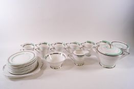 A Shelley Art Deco porcelain teaset for twelve persons with green and 'silver' band decoration,
