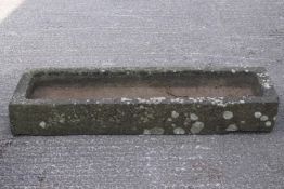 A rectangular stone shallow trough,