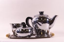 A 1930s Continental silver plated three piece teaset, stamped Baumlin,