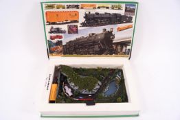 A 'Tiny Trains' working model within a book layout, 1:900 scale,