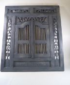 A hanging wall mirror with carved pierced frame and two hinged doors, grey painted, 89.5cm high, 78.