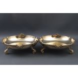 A pair of round silver bon-bon dishes by Goldsmiths & Silversmiths Co,