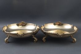 A pair of round silver bon-bon dishes by Goldsmiths & Silversmiths Co,