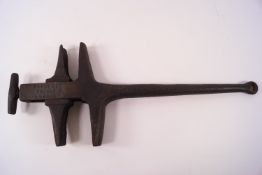 A wheelwright's adjustable hub cap spanner, stamped March & Co,