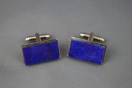 A boxed set of Lapis Lazuli cufflinks with T bar fitting.