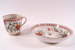 An 18th century English porcelain cup and saucer,