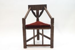 A late Victorian turned oak turner's chair, Folk art carved decoration,