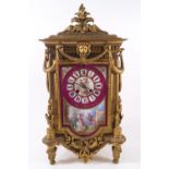 A 19th century French gilt metal and porcelain mantel clock,